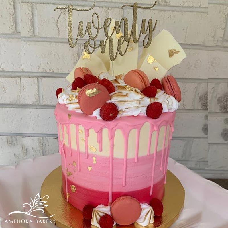 The Flour Girl Bakeshop - A Louis Vuitton inspired birthday cake, trimmed  with roses, caramel macarons, and Ferraro Rocher chocolates. #louisvuitton  #luxurybrand #birthdaycake #macarons #ferrerorocher #homemade #flourgirlvt  #homebakery #gourmetcakes