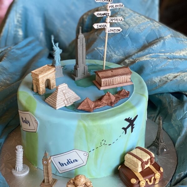 Celebrate Return with a Travel-Inspired Welcome Back Cake